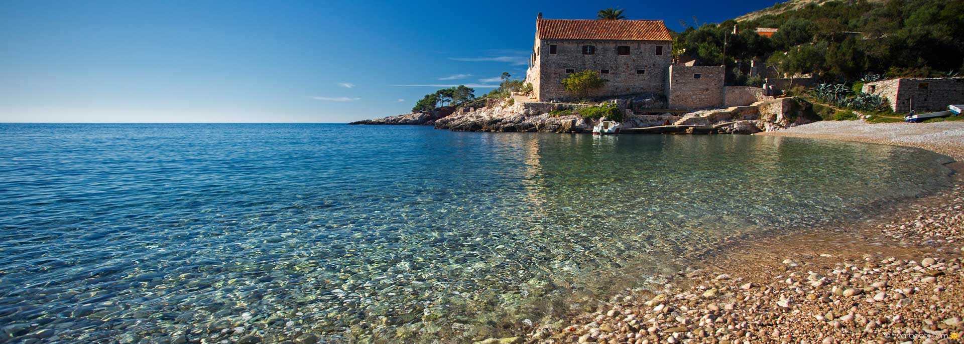 Hire a small boat and visit hidden bays